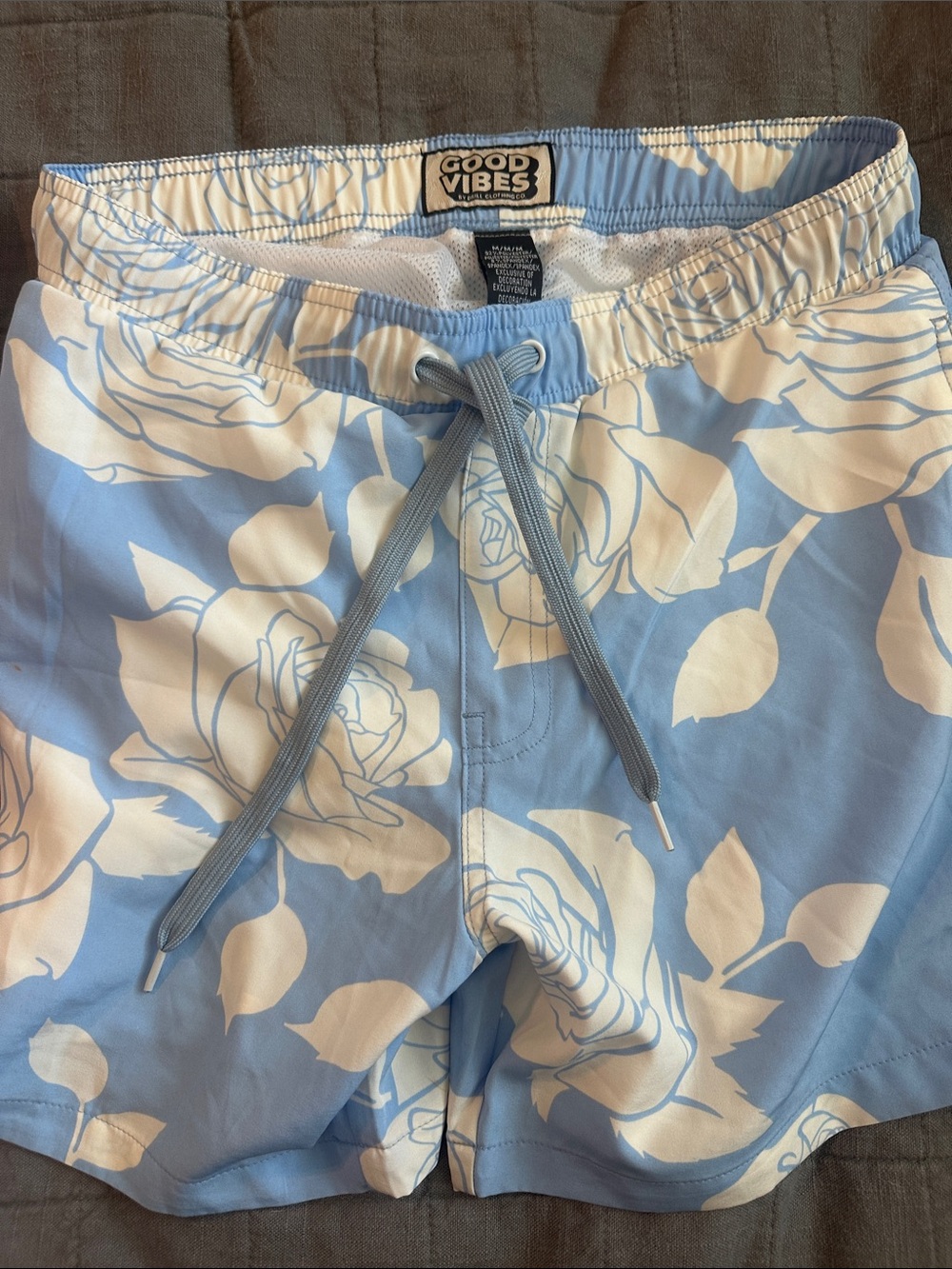 Good Vibes Men’s Light Blue Floral Swim Trunks
